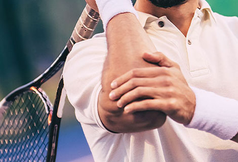 patient suffering with elbow pain