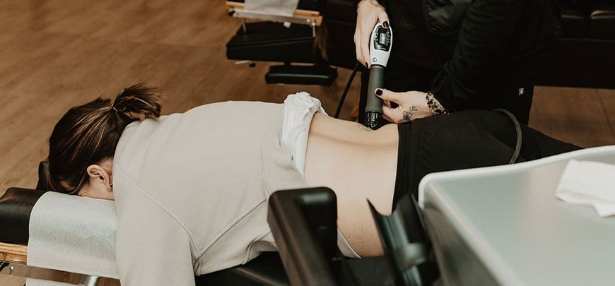 patient receiving shockwave therapy at Monumental Health and Wellness in Colville